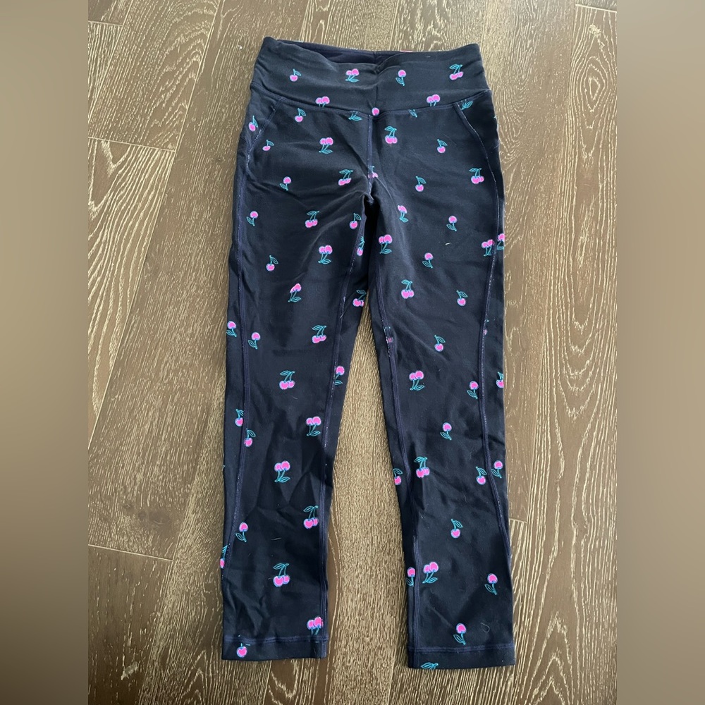 New Balance navy blue leggings with cherry print. Never worn